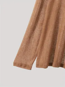 Close-up of lightweight brown ribbed long-sleeve T-shirt fabric and hem details.