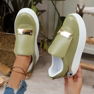 Elegant olive green platform slip-on loafers for women with gold buckle detail