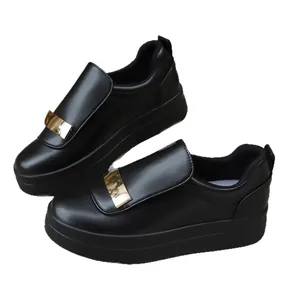 Stylish black platform slip-on loafers for women with elegant gold buckle and round toe