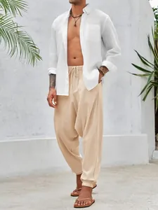 Lässige Herren-Haremshose aus Baumwolle und Leinen in Beige mit elastischen Bündchen