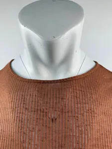 Detail shot of a brown round neck ribbed long sleeve thin top on a white mannequin