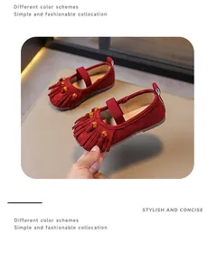 Stylish red Mary Jane shoes for girls with fringe detail and amber beads decoration.
