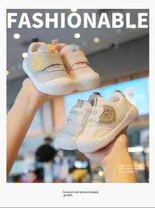 Macro detail showing the breathable mesh and soft soles of infant walking shoes