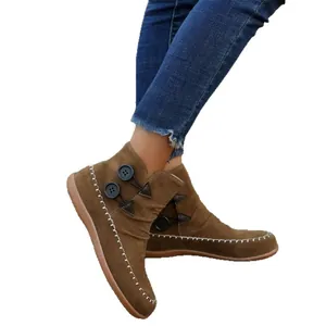 Stylish women's brown suede ankle boots with button decor and white contrast stitching
