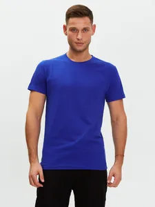 Front view of a vibrant royal blue drop shoulder pure cotton t-shirt on a male model