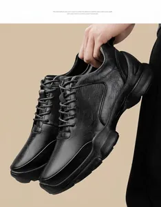 Detailed view of black men's outdoor casual hiking shoes with durable non-slip rubber soles