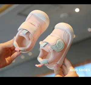 Detail view of pink breathable mesh baby walking shoes with soft anti-slip soles.