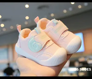 Close-up of pink breathable mesh baby walking shoes with anti-slip soft soles