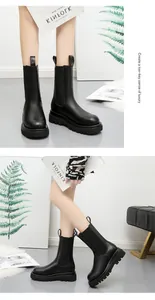 Botas Chelsea negras con plataforma para mujer, suela track gruesa y diseño de media caña.