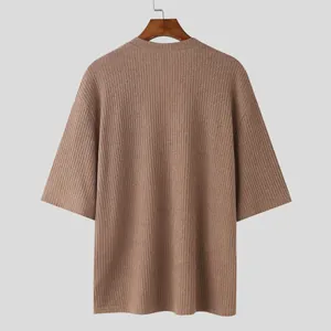 Casual brown ribbed knit half-sleeve shirt for men, loose fit stretch fabric back view