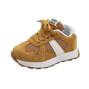 Detail of yellow mesh breathable German Army Trainer style sneaker with white thick sole.