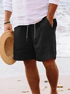 Detail view of men's black linen beach shorts with adjustable drawstring waist