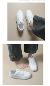 Vue détaillée de baskets blanches à plateforme élégantes avec un design à lacets