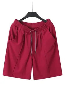 Front view of men's burgundy linen shorts with drawstring and elastic waist