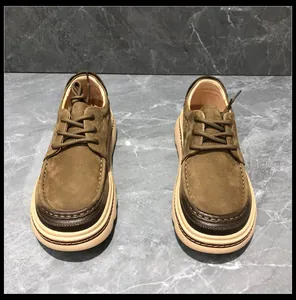 Detailed top view of olive green suede men's loafers with thick soft soles.