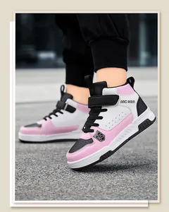 Side detail of pink and white kids high-top sneakers with the ABC SHIELD logo