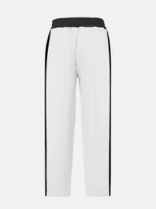 Detail of heavy French terry sweatpants with contrast side stripes and straight cut