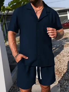 Detail view of navy blue waffle texture short-sleeved shirt and shorts set for men.