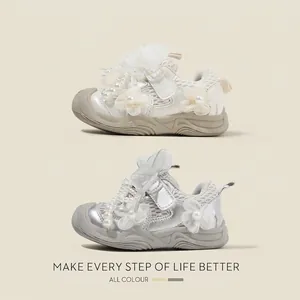 Elegant toddler girl walking sneakers with pearl beads and fabric floral accents