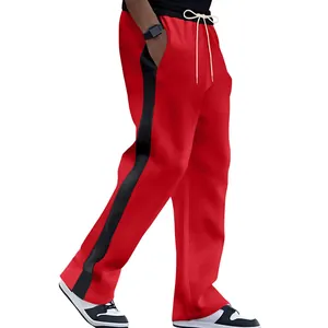 Detailed side profile of men's red heavyweight sweatpants with black side stripes