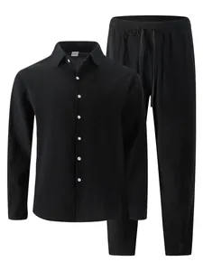 Detail view of black men's breathable linen blend shirt and trousers leisure set