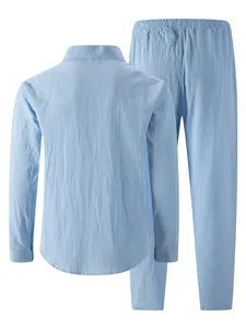 Back view of a light blue linen shirt and trousers set for men in breathable fabric.