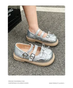 Shiny silver metallic Mary Jane shoes for girls featuring elegant bow and buckle details