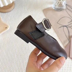 Stylish dark brown faux leather Mary Jane shoes for girls with decorative buckle strap