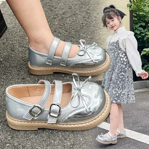 Shiny silver girls' Mary Jane shoes with sweet bow and double buckle detail