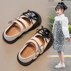 Elegant girl's Mary Jane princess shoes with bow and double straps in classic colors.