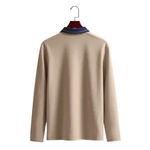 Back view of a khaki long-sleeve polo shirt with contrast navy blue collar detail.