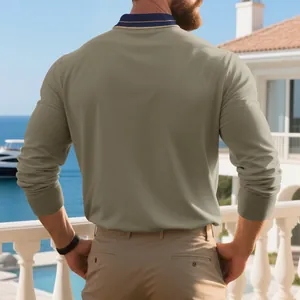 Detailed back view of men's khaki long-sleeve polo shirt with navy contrast tipped collar