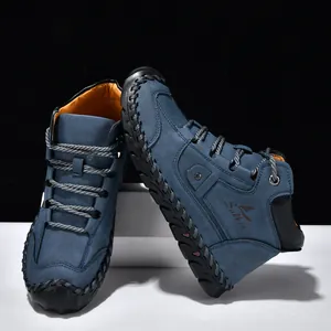 Stylish hand-stitched blue leather ankle boots for men featuring textured rope laces