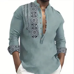 Detail of men's ethnic print shirt with stand collar and long sleeves.