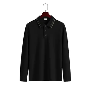 Detail of a black long-sleeved piqué polo shirt with striped collar on a hanger