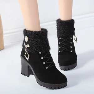Detailed view of black chunky heel ankle boots with rhinestones and knit wool collar