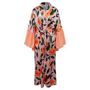 Robe de plage longue à imprimé floral élégante avec des manches cloche très stylées