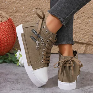 Brown high-top canvas sneakers for women with decorative zippers and heart charms.