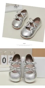Detail view of silver Mary Jane girl shoes with double bow design and round toe finish