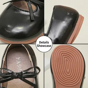 Detailed close-up of girls black patent leather Mary Jane flats with ribbon bow