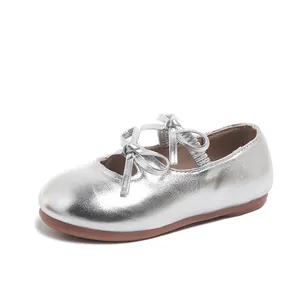 Elegant shiny silver Mary Jane princess shoes for girls with bow and elastic strap