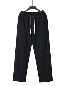 Full front view of men's black linen cotton casual pants with drawstring elastic waist