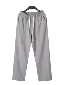 Men's breathable grey linen trousers with drawstring elastic waist and straight leg cut