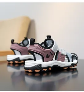 Close-up of pink and grey boy's sport sandals with breathable mesh and anti-slip soft sole