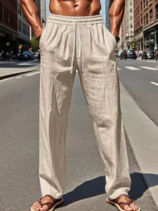 Detailed shot of breathable cotton linen pants featuring drawstring elastic waist