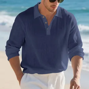 Close-up of men's loose fit blue linen long sleeve Polo shirt for casual vacation
