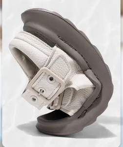 Close-up shot demonstrating the flexible soft sole of children's leather sports sandals
