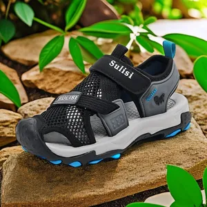 Durable kids' closed-toe outdoor sports sandals with breathable mesh in black and blue