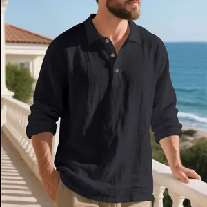 Casual men's black long sleeve linen polo shirt with buttons on a coastal balcony