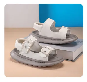 Stylish white children's sandals with soft soles and adjustable buckles for summer